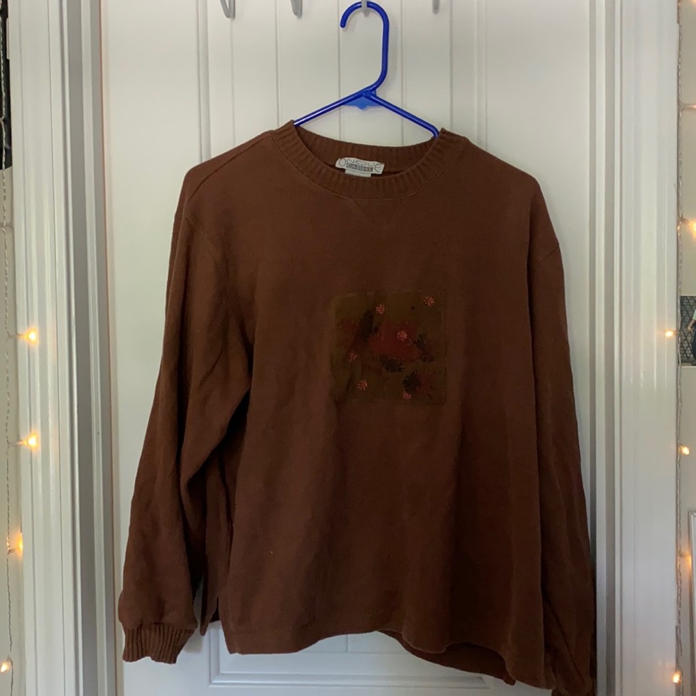 Cute oversized sweater, XL color is brown. Cute deign in middle.